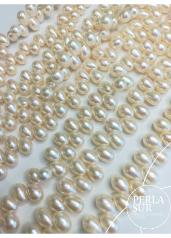 Hilo Perla Oval Cruzada 6-7mm Blanca