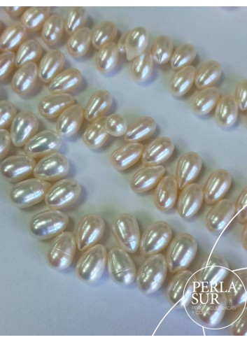 Hilo Perla Oval Cruzada 7x10mm Blanca