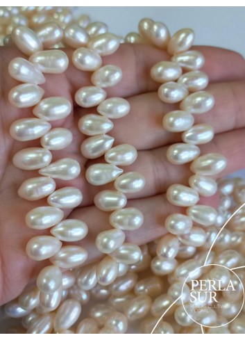 Hilo Perla Oval Cruzada 7x10mm Blanca