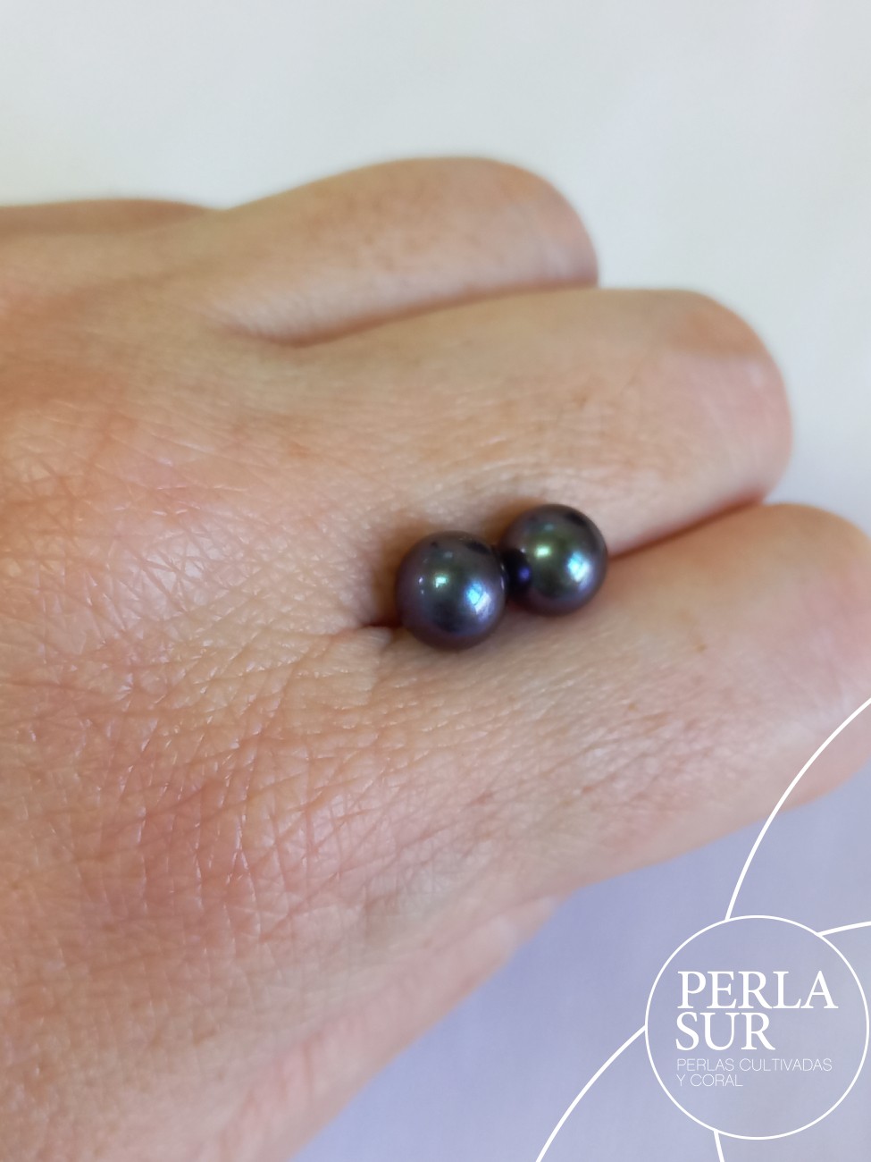 Pareja perla 1/2t 7-7'5mm azul peacock