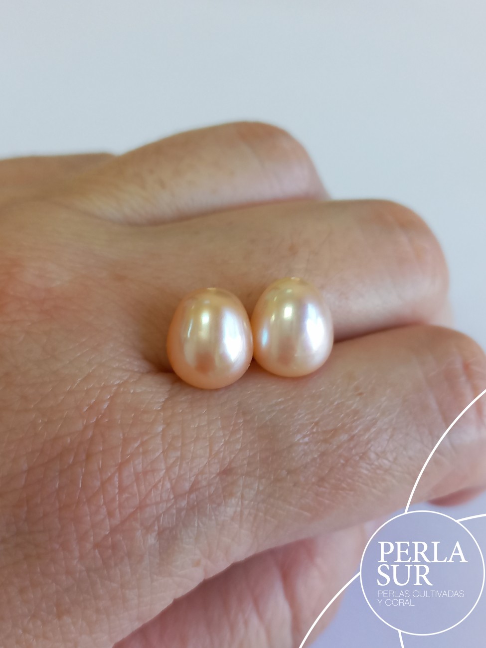 Pareja Perla Oval 10-10'5mm 1/2 T. C. Natural Peach Fuzz