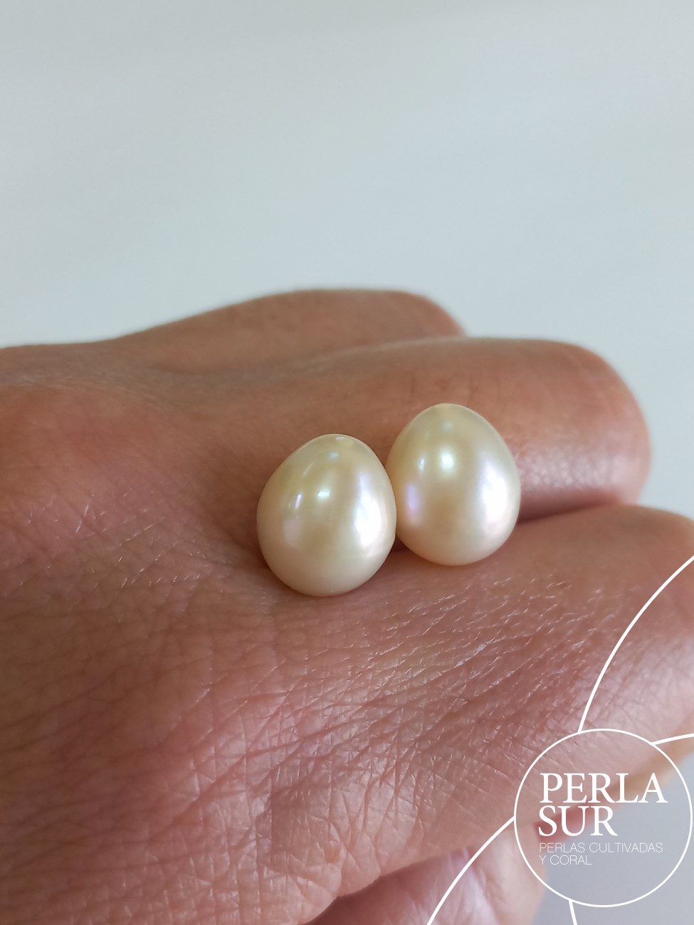 Pareja Perla Oval 10-10'5mm 1/2 T. C. Natural Peach Fuzz