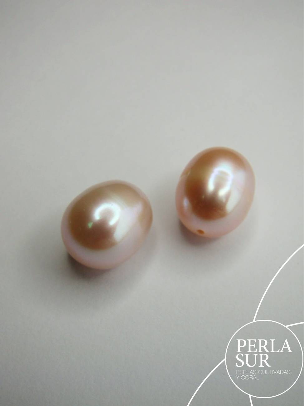 Pareja Perla Oval 10-10'5mm 1/2 T. C. Natural Peach Fuzz