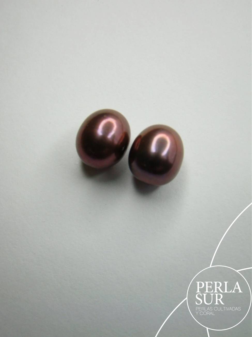 Pareja Perla 8-8'5mm Berenjena 1/2t Oval Peacock