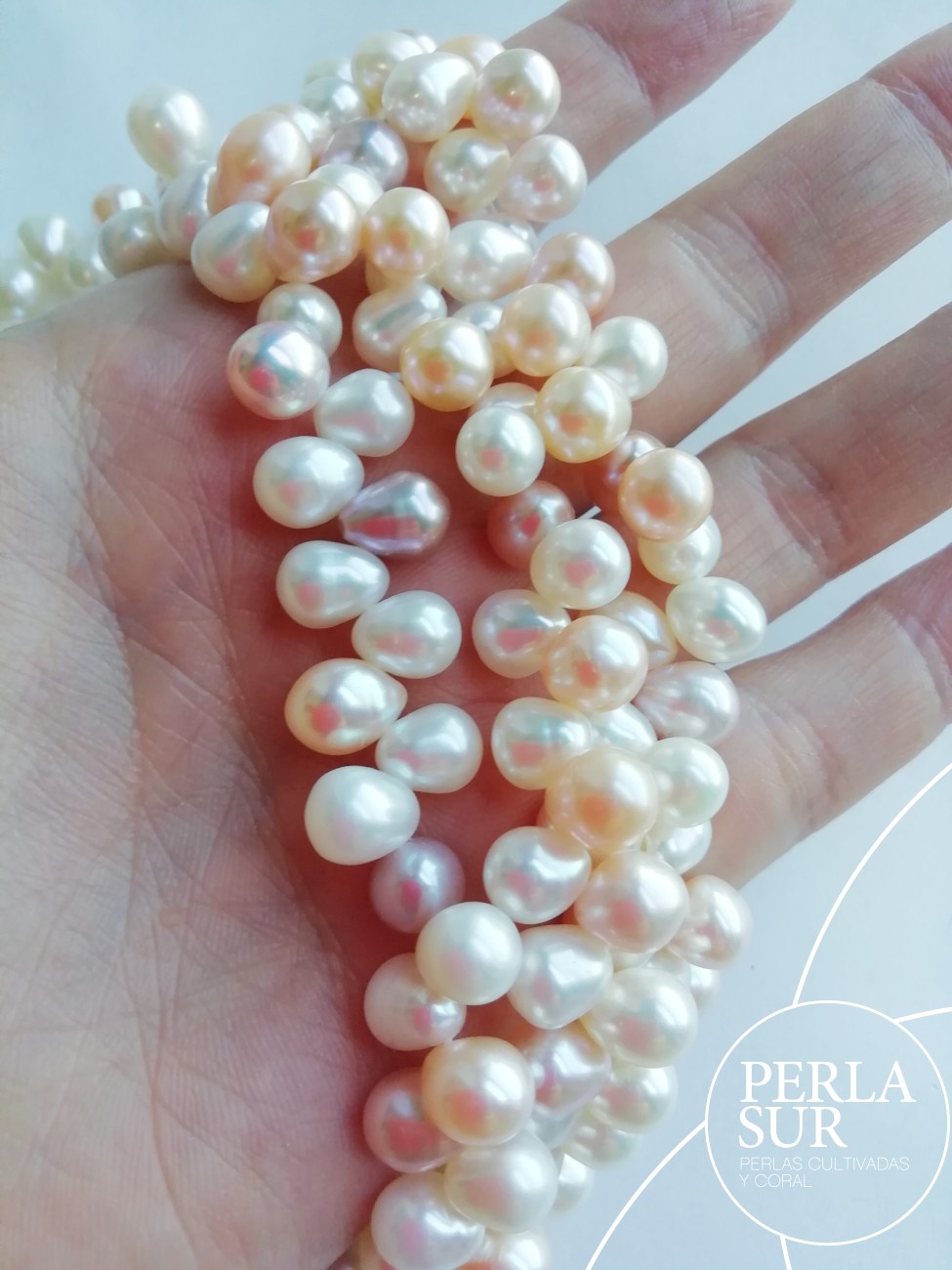 Hilo perla oval cruzada 7-8mm multicolor natural