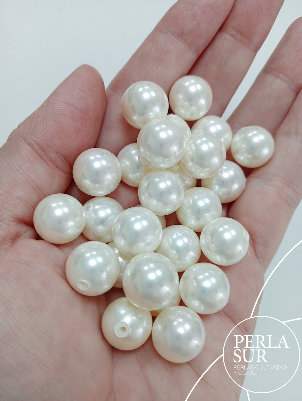 Perla shell 12mm 1/2t esférica blanca-crema