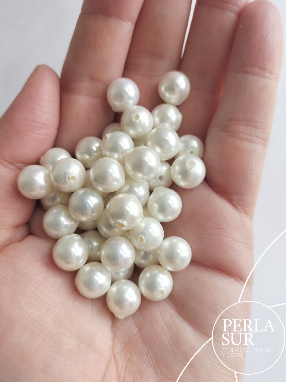 Perla shell 8mm 1/2t esférica blanca