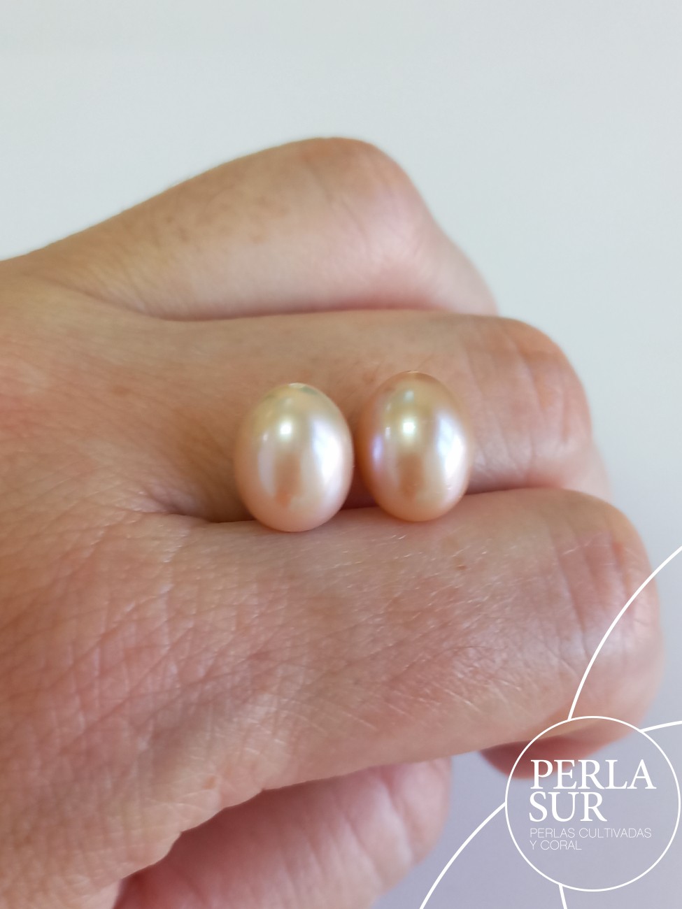 Pareja Perla 9x13mm Oval 1/2T. Color Natural