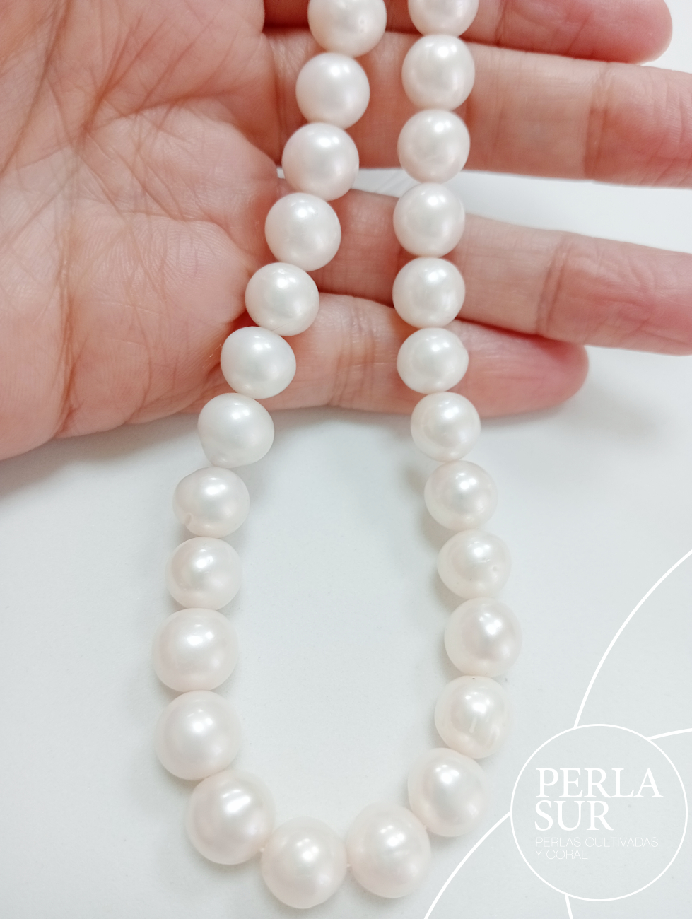 Hilo perla semiredonda 9-9'5mm blanca 37cm