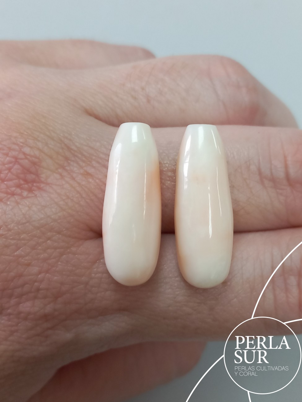 Pareja perillas 26x9mm 1/2t coral rosa