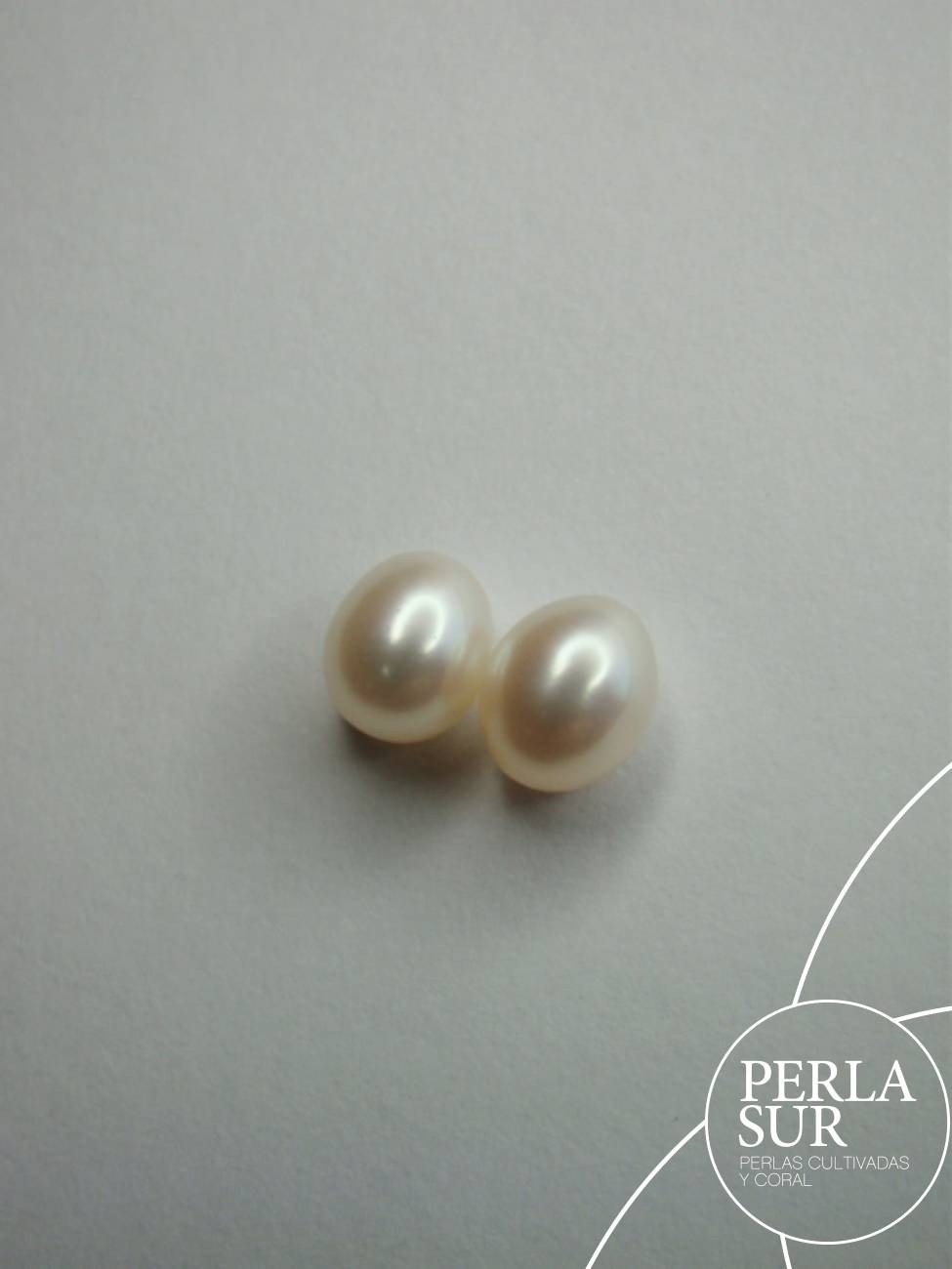 Pareja Perla Oval 6x8mm 1/2T. Blanca