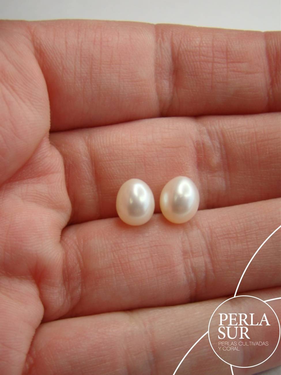 Pareja Perla Oval 6x8mm 1/2T. Blanca