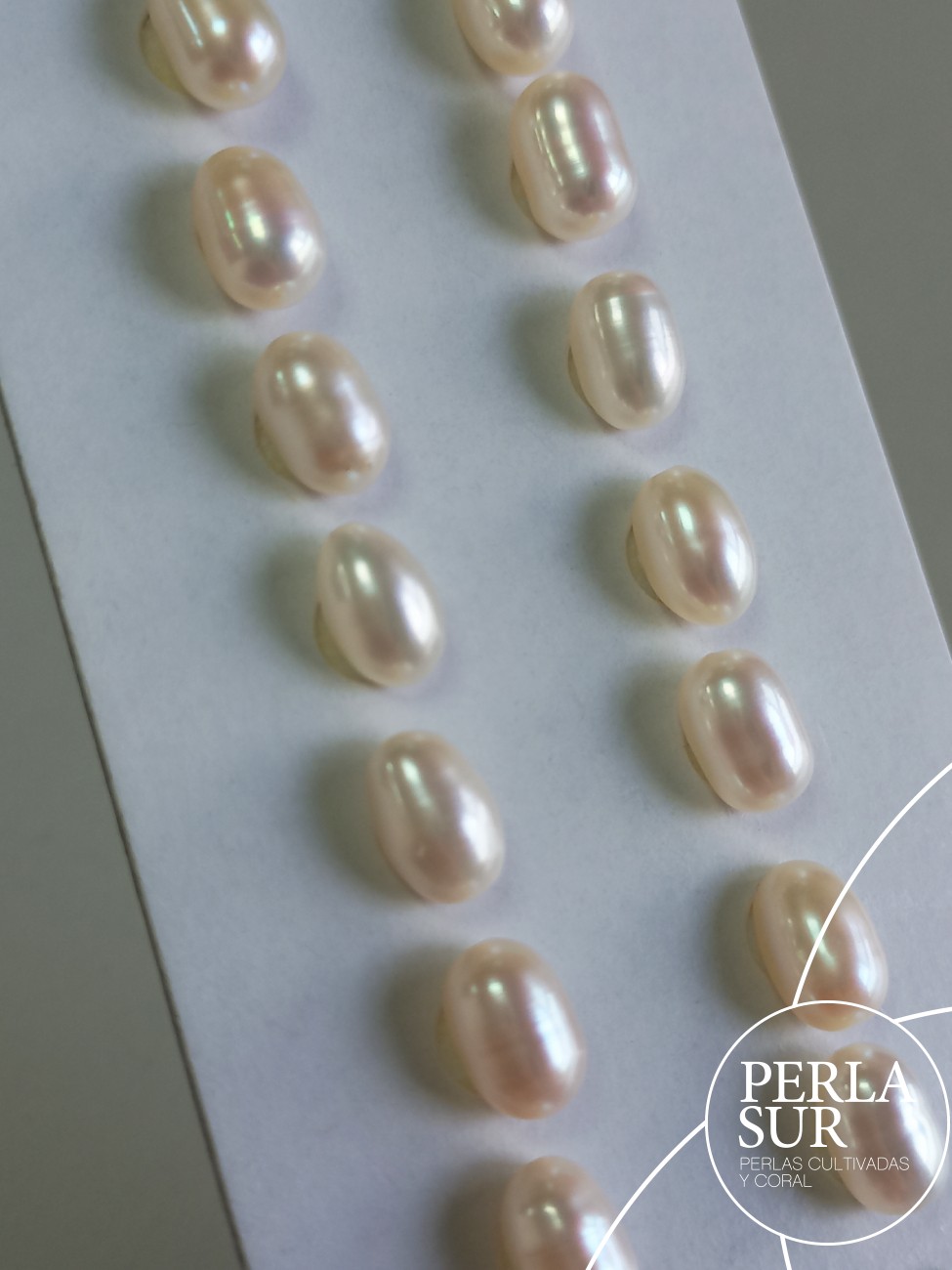 Pareja Perla Oval 5x8mm 1/2T. Blanca