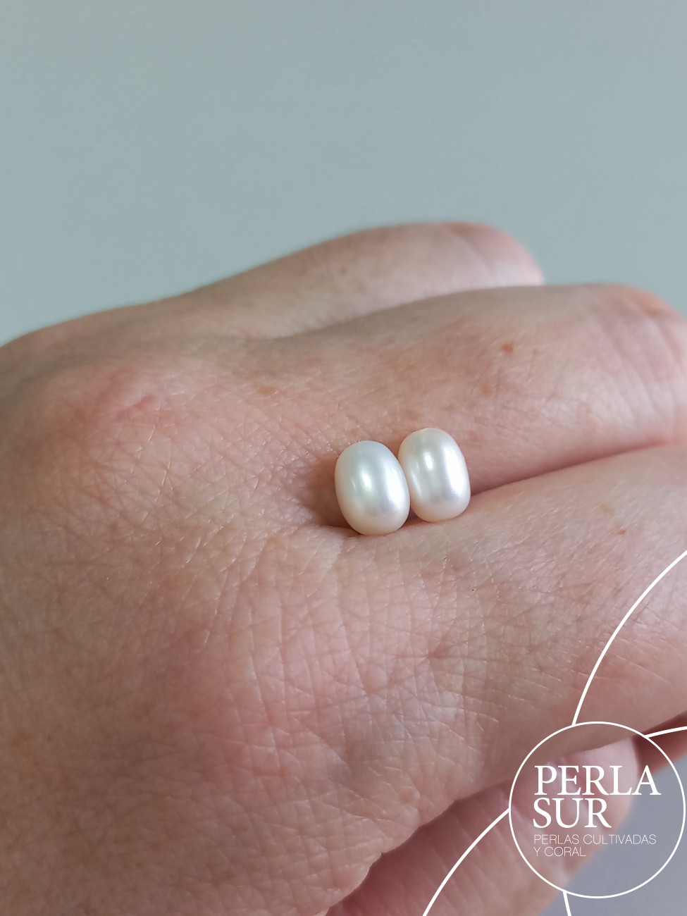 Pareja Perla Oval 5x7mm 1/2T. Blanca