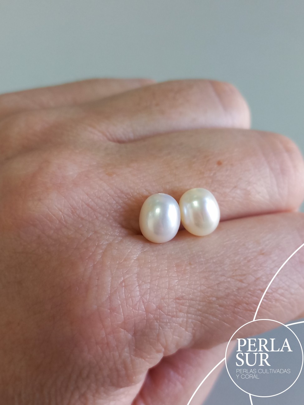 Pareja Perla Oval 7x8'5mm 1/2T. Blanca