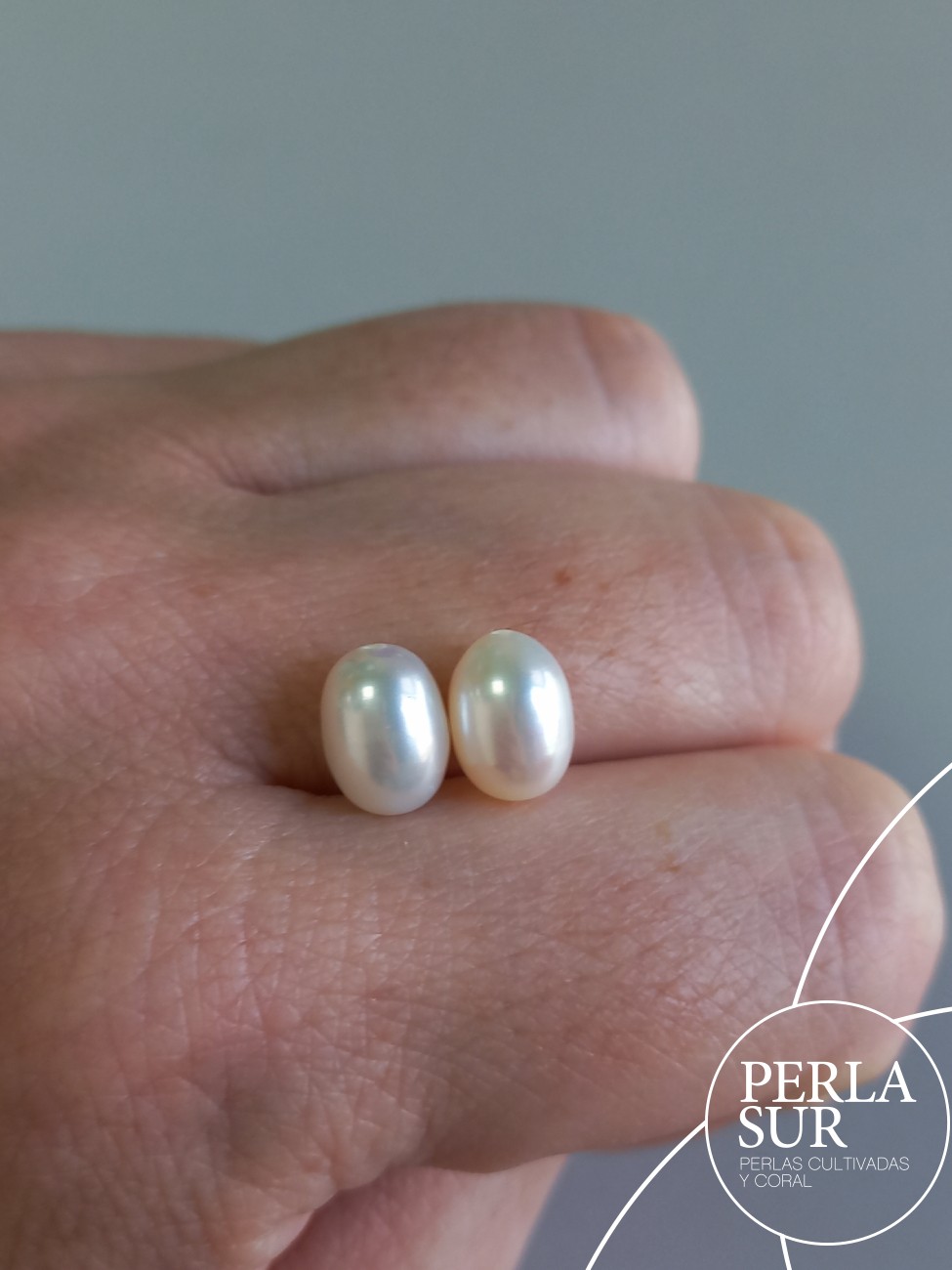 Pareja Perla Oval 7x9mm 1/2T. Blanca