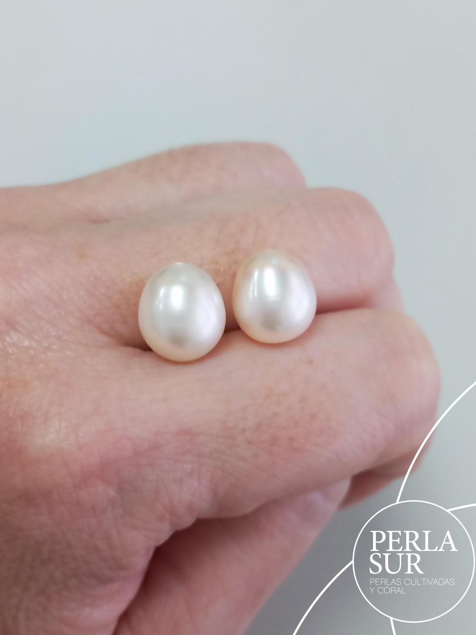 Pareja Perla Oval 10x11'5mm 1/2T. Blanca