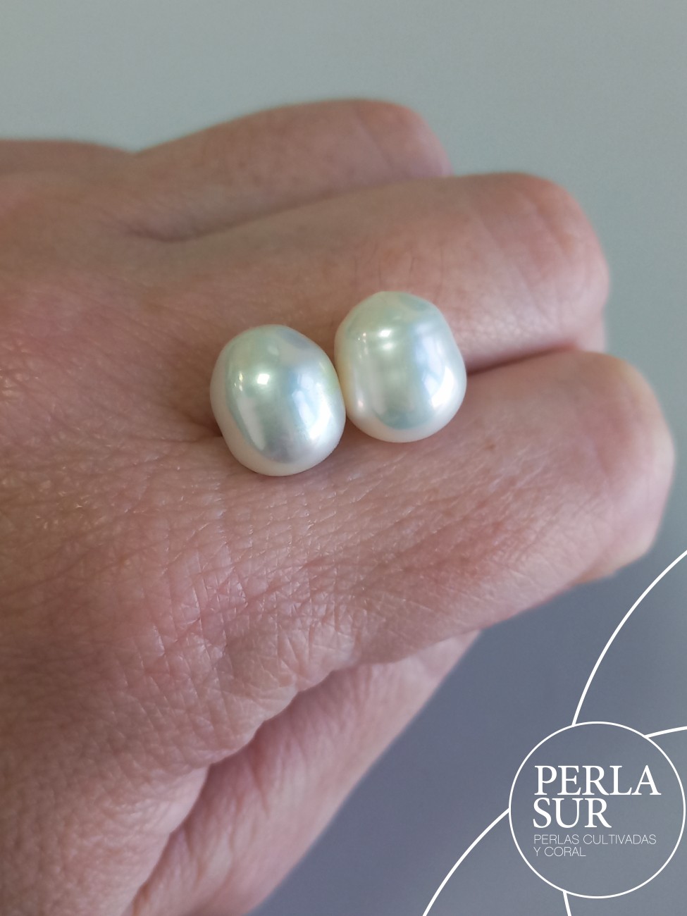 Pareja Perla Oval 10x12mm 1/2T. Blanca