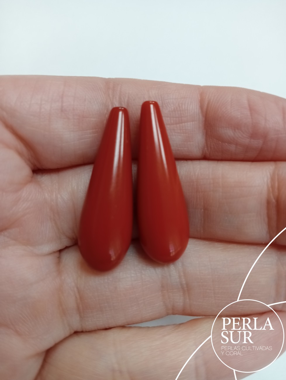 Perilla 10x32mm pasada coral sintético (rojo)