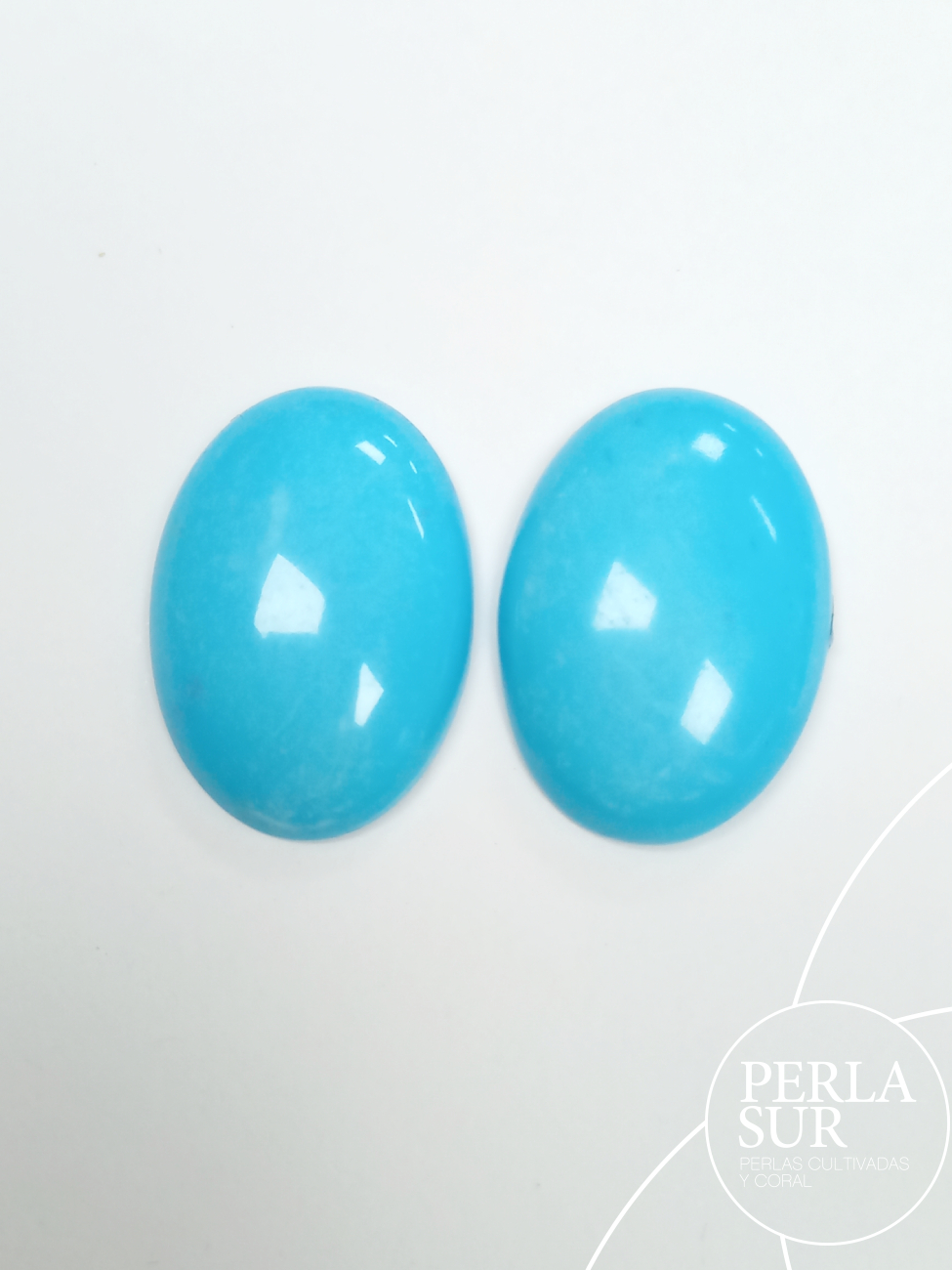 Pareja cabujones 22x16'5x6'5mm oval turquesa natural