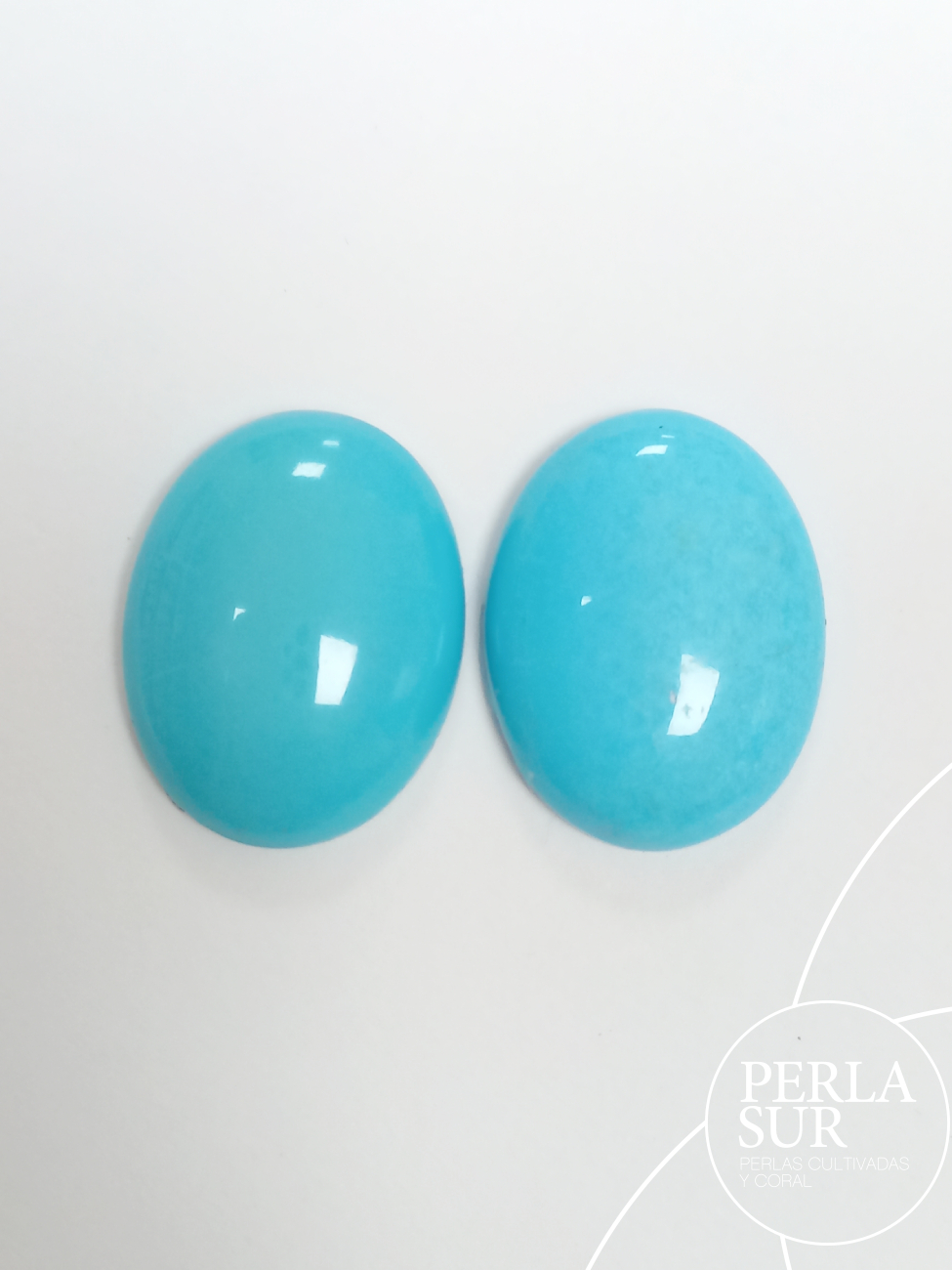 Pareja cabujones 22x17x5'5mm oval turquesa natural