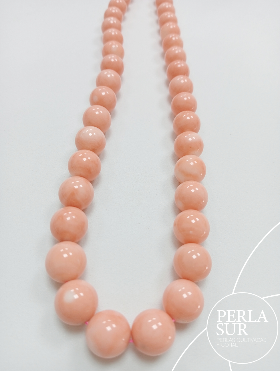 Collar Bola Coral Piel de Ángel 9'7x12mm 58cm