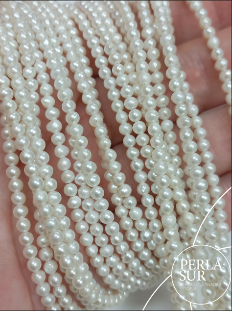 Hilo perla redonda 2'5-3mm blanca